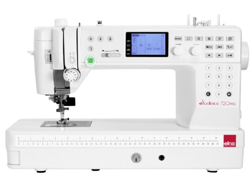 Machine à coudre électronique Elna eXcellence 720 PRO avec table d'extension installée, prête à l'emploi.